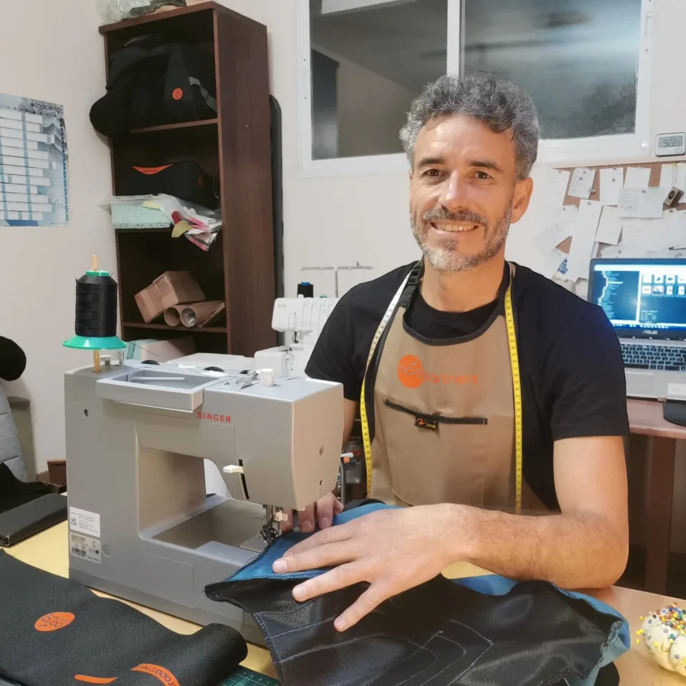 Aldo making an Acropartners pillow